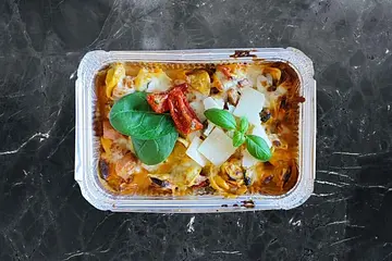 61. Pasta tortellini con prociutto