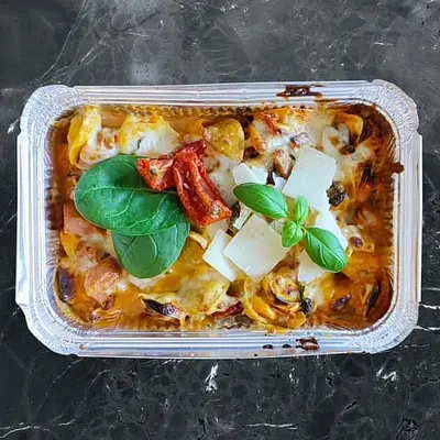 65. Pasta tortellini con prociutto